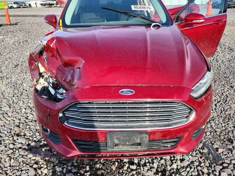 Photo 11 from auction – 2015 FORD FUSION SE with VIN 3FA6P0H77FR181068