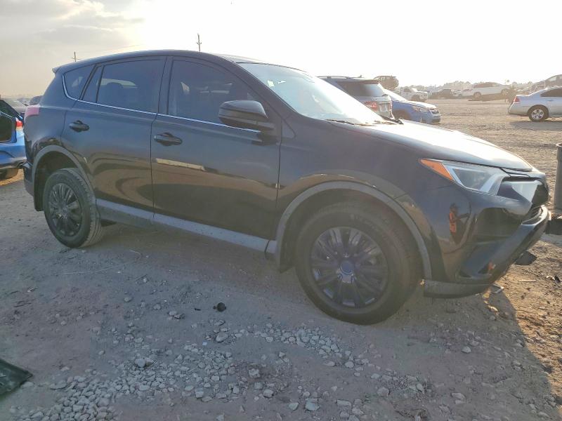 Photo 4 from auction – 2018 TOYOTA RAV4 with VIN 2T3ZFREVXJW450928