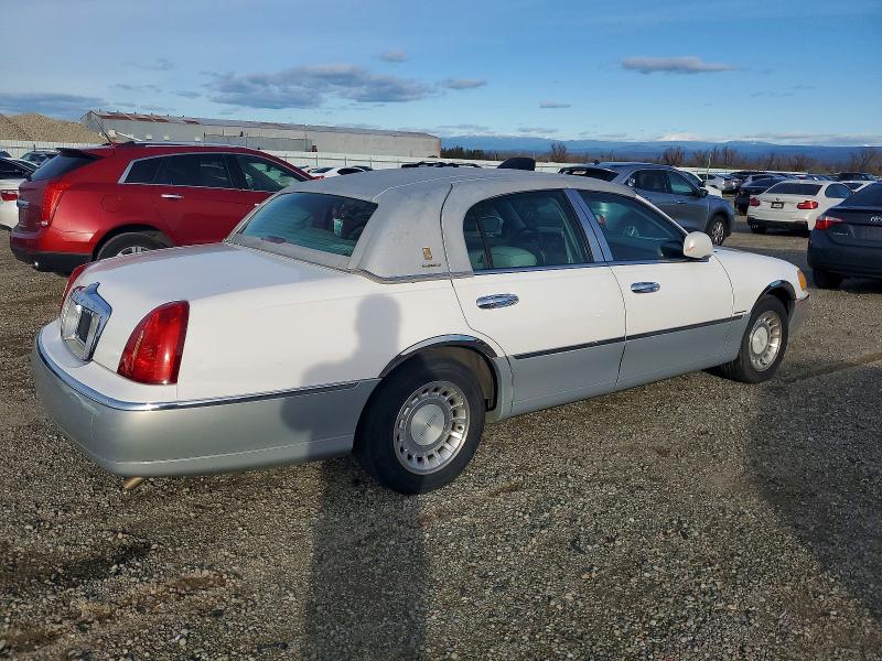 Photo 3 from auction – 2001 LINCOLN TOWN CAR E with VIN 1LNHM81W11Y659356
