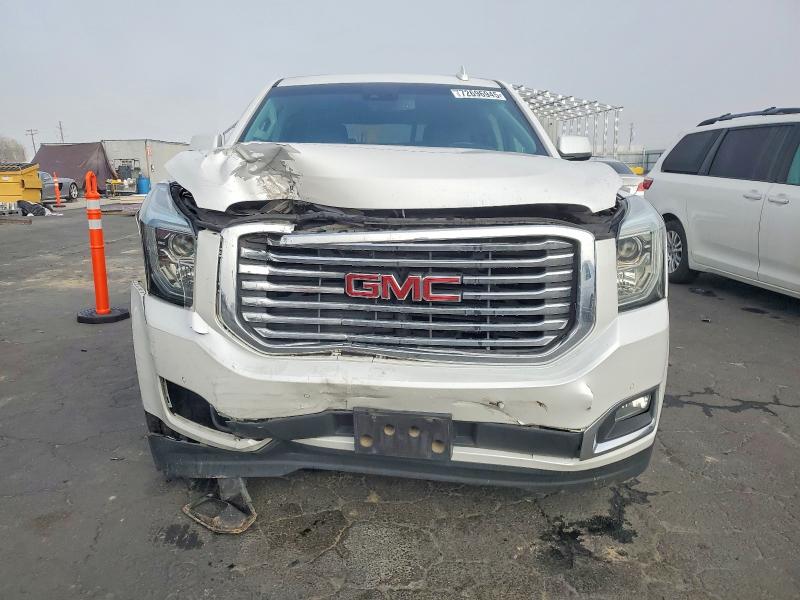 Photo 5 from auction – 2019 GMC YUKON SLT with VIN 1GKS1BKC7KR309198