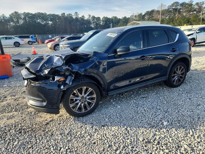 MAZDA CX-5 2019 with VIN JM3KFADM5K1560286 - Photo from auction