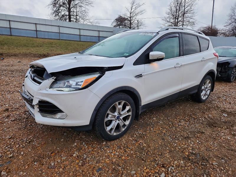 FORD ESCAPE TIT 2016 with VIN 1FMCU9J91GUB59062 - Photo from auction