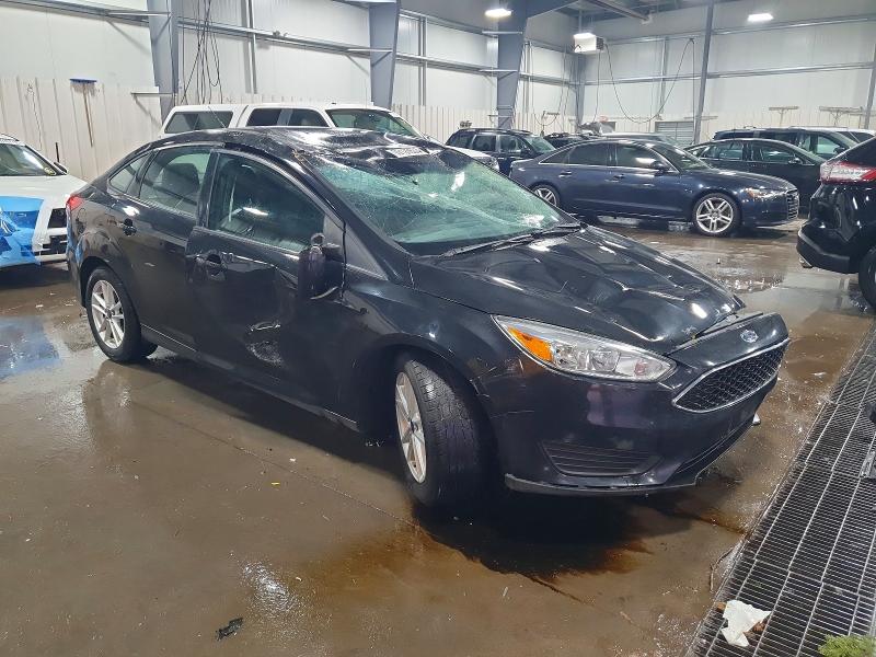 Photo 4 from auction – 2015 FORD FOCUS SE with VIN 1FADP3F20FL357716