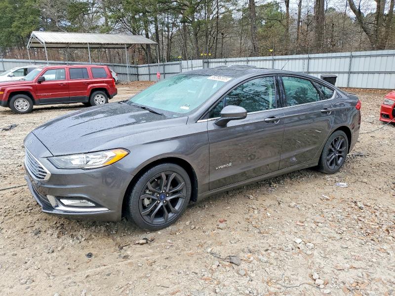 FORD FUSION 2018 with VIN 3FA6P0LU5JR276296 - Photo from auction