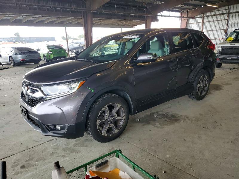 HONDA CR-V 2018 with VIN 7FARW1H87JE034210 - Photo from auction