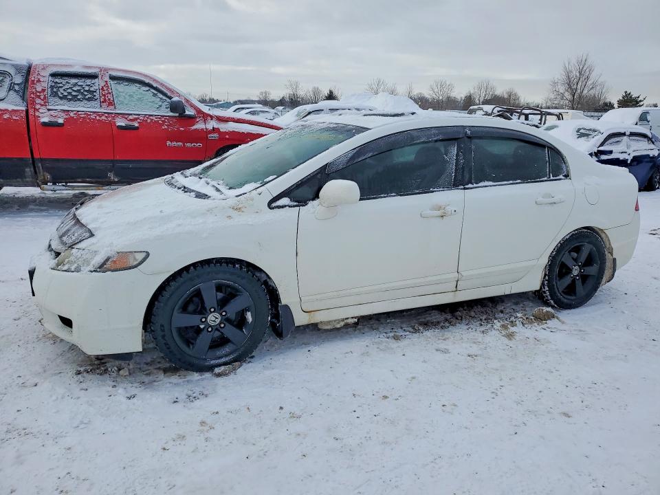 HONDA CIVIC LX-S 2011 with VIN 2HGFA1F61BH012909 - Photo from auction