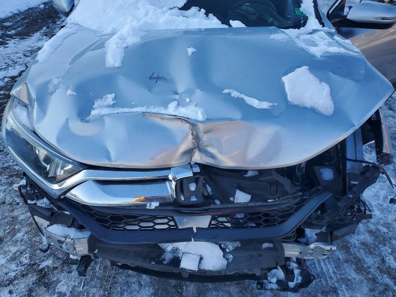Photo 12 from auction – 2018 HONDA CR-V EX with VIN 7FARW2H53JE106094