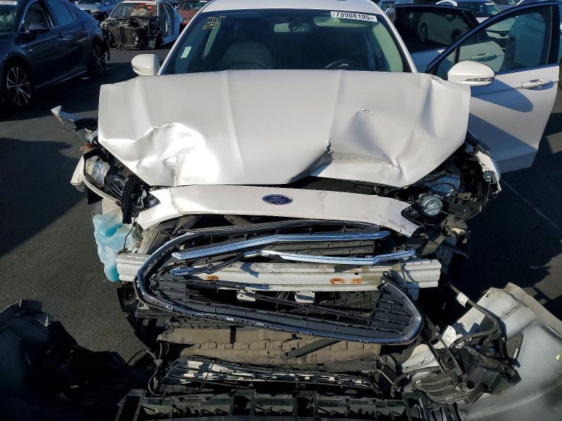 Photo 11 from auction – 2016 FORD FUSION SE with VIN 3FA6P0HD1GR259884