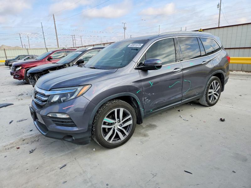 Photo 1 from auction – 2016 HONDA PILOT TOUR with VIN 5FNYF5H9XGB003355