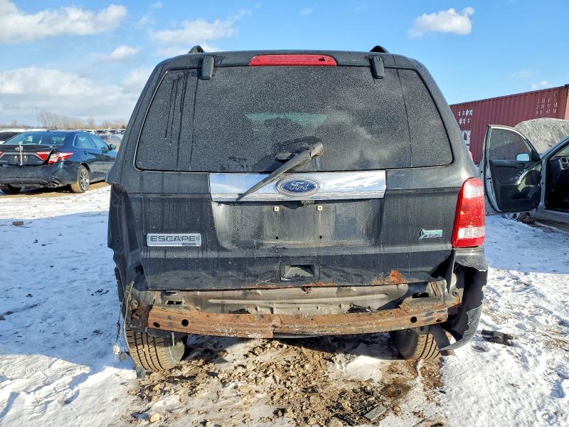 Photo 6 from auction – 2011 FORD ESCAPE with VIN 1FMCU0EG8BKB44339