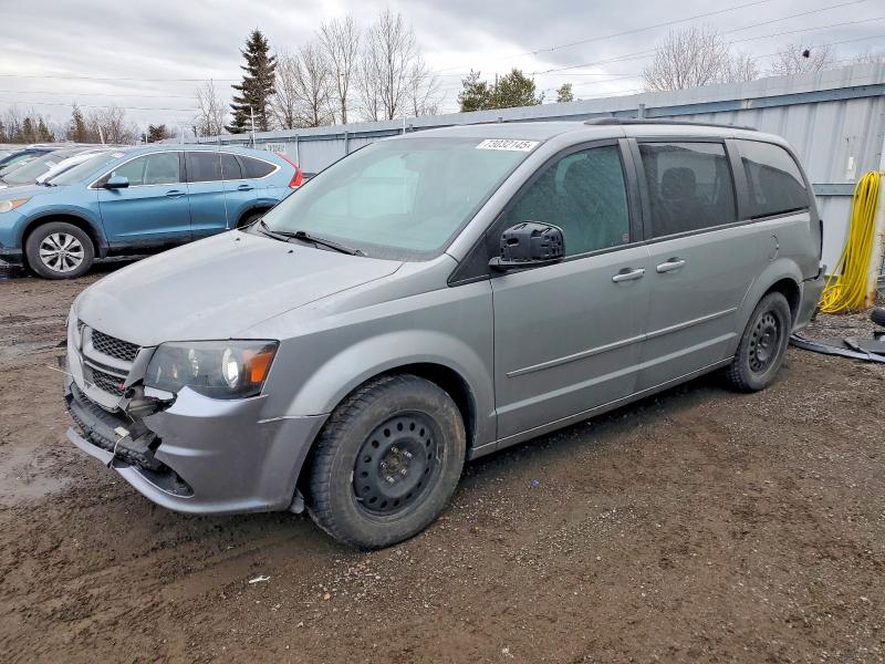 DODGE GRAND CARA 2015 with VIN 2C4RDGEG3FR643094 - Photo from auction