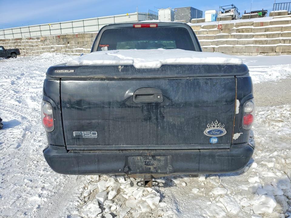 Photo 6 from auction – 2001 FORD F150 with VIN 1FTRW07L21KE74981