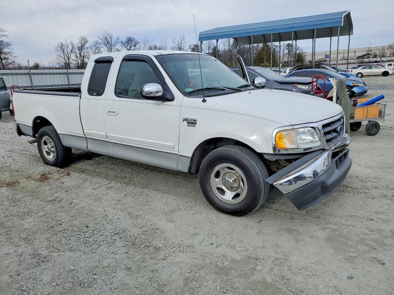Photo 4 from auction – 2001 FORD F150 with VIN 1FTRX17W81NA00366