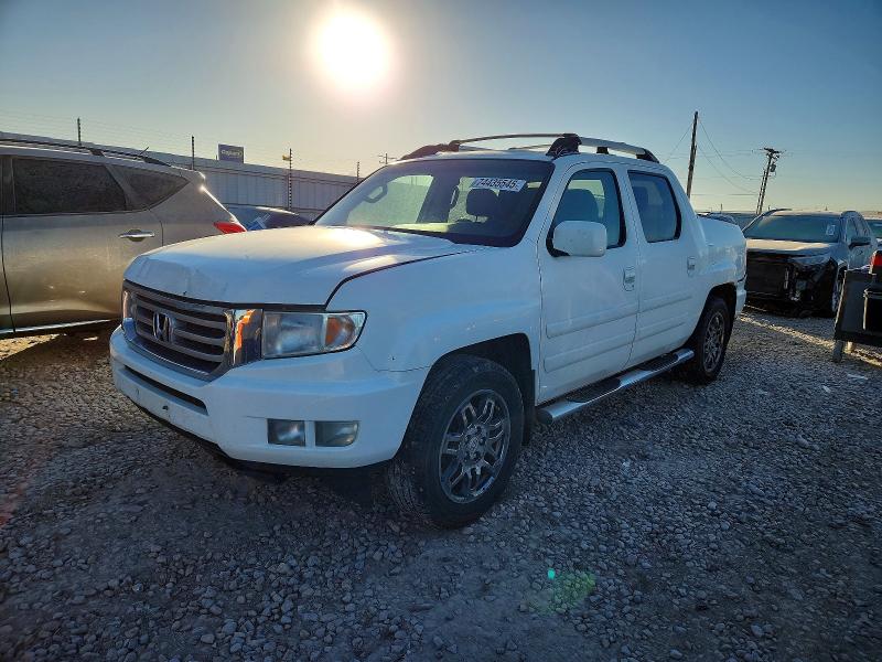 HONDA RIDGELINE 2012 with VIN 5FPYK1F58CB453074 - Photo from auction
