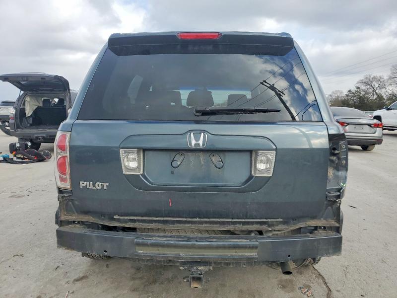 Photo 6 from auction – 2006 HONDA PILOT EX with VIN 5FNYF28556B031672