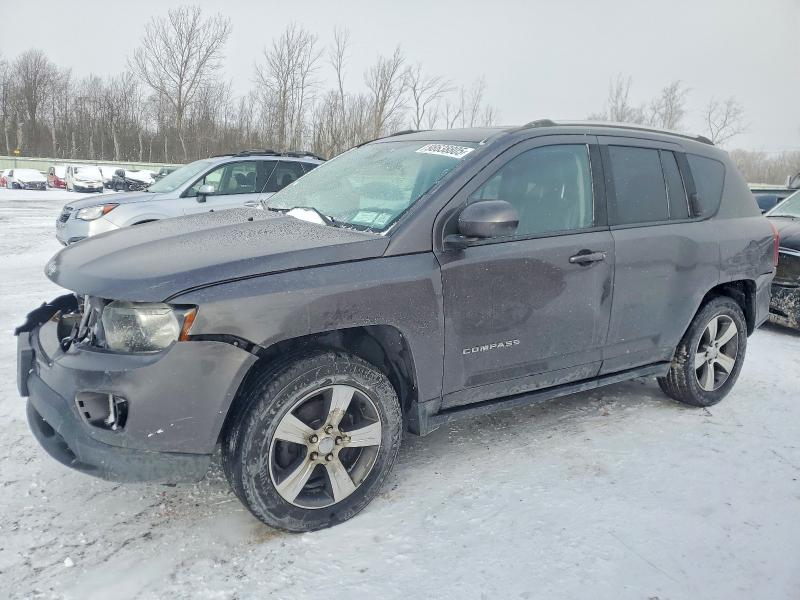 JEEP COMPASS 2016 with VIN 1C4NJDEBXGD697099 - Photo from auction