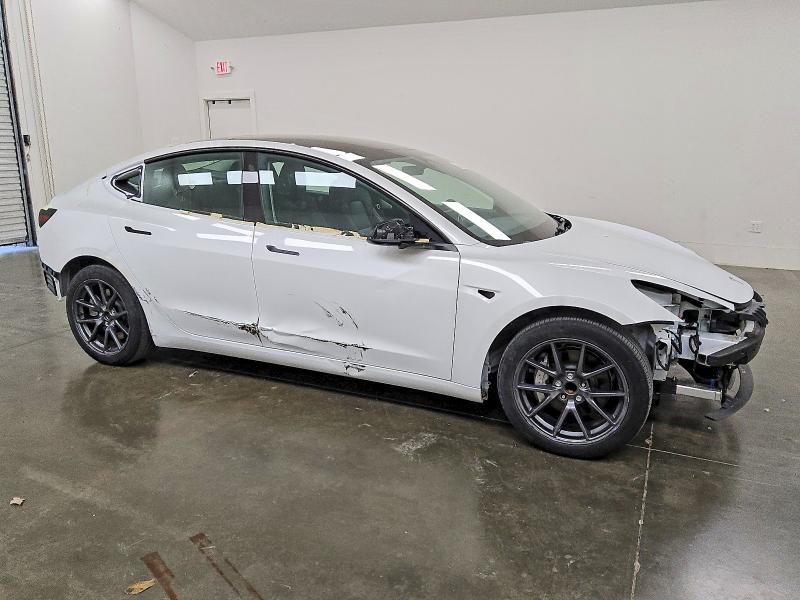 Photo 4 from auction – 2023 TESLA MODEL 3 with VIN 5YJ3E1EA4PF624157