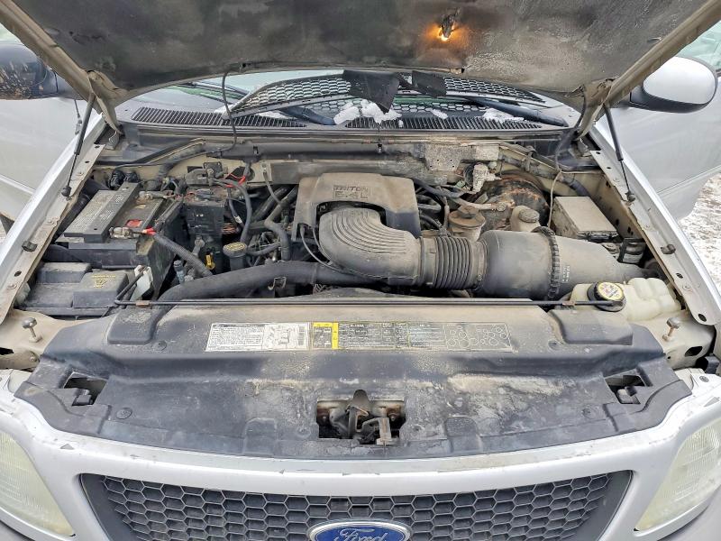 Photo 11 from auction – 2002 FORD F150 with VIN 2FTRX18L02CA38041