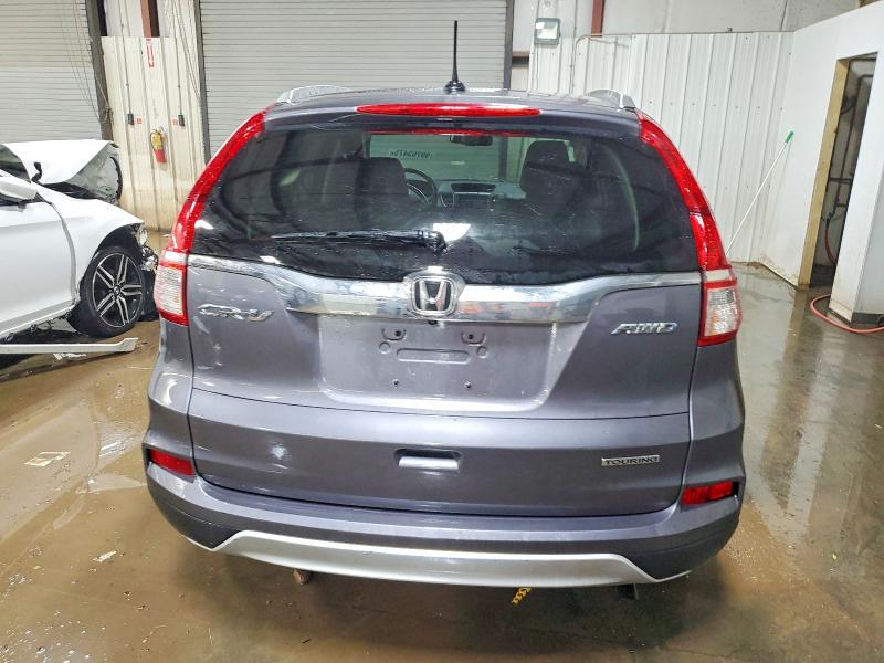 Photo 6 from auction – 2015 HONDA CR-V TOURI with VIN 5J6RM4H95FL118097