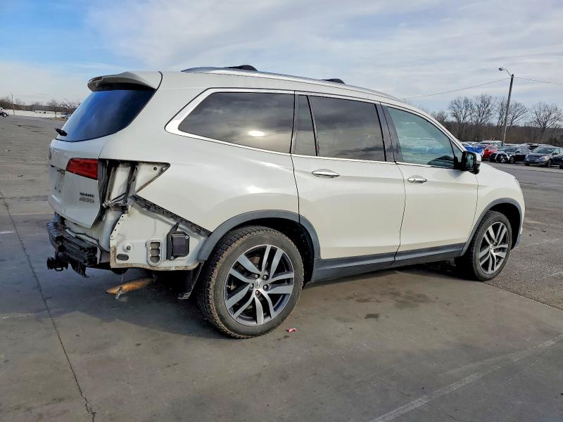 Photo 3 from auction – 2017 HONDA PILOT TOUR with VIN 5FNYF6H9XHB064762