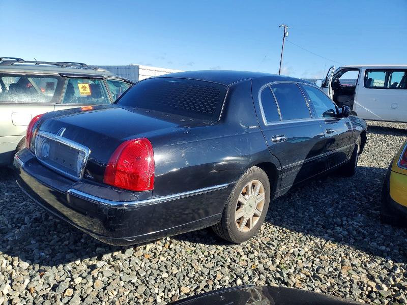 Photo 3 from auction – 2011 LINCOLN TOWN CAR E with VIN 2LNBL8EVXBX753862