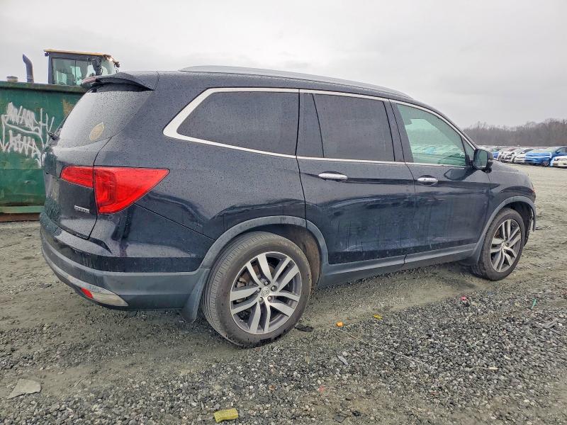 Photo 3 from auction – 2016 HONDA PILOT TOUR with VIN 5FNYF5H91GB047731