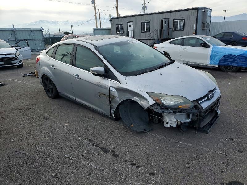 Photo 4 from auction – 2014 FORD FOCUS with VIN 1FADP3J28EL219573