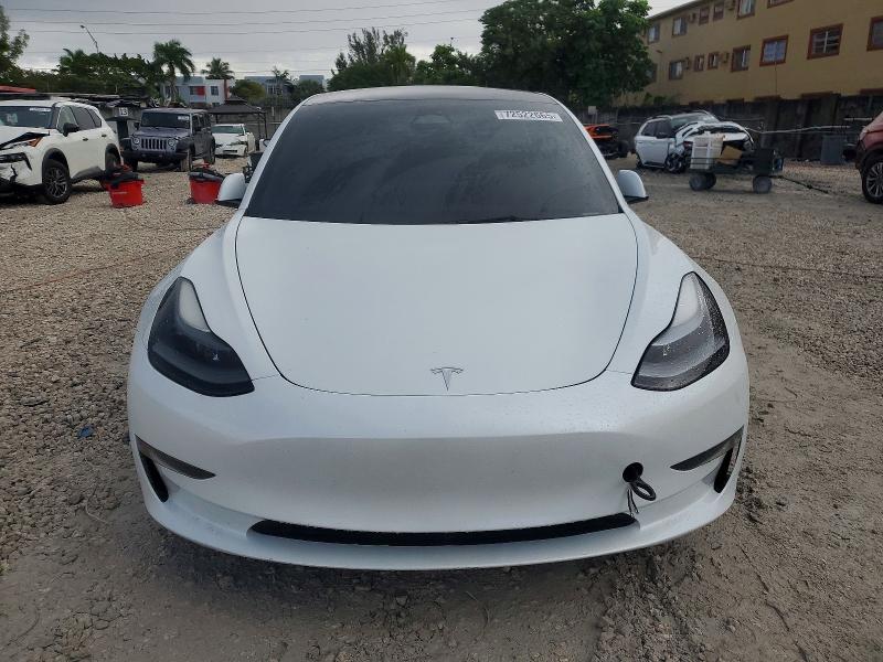 Photo 5 from auction – 2023 TESLA MODEL 3 with VIN 5YJ3E1EC9PF518935