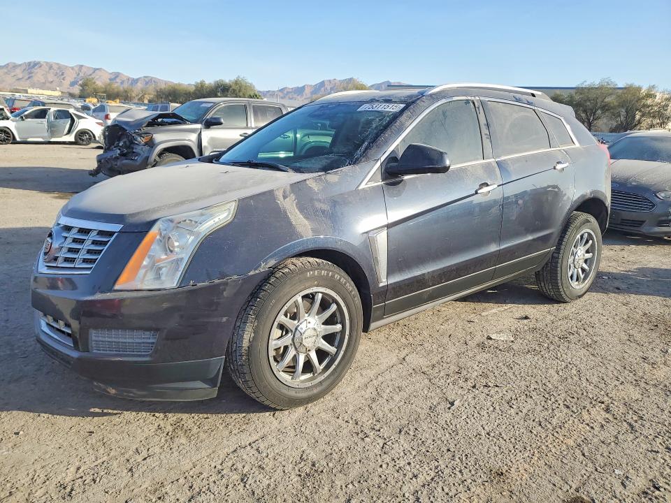 CADILLAC SRX 2014 with VIN 3GYFNBE33ES659856 - Photo from auction