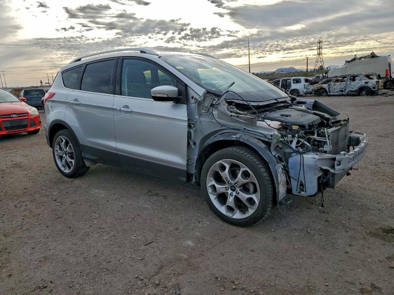 Photo 4 from auction – 2014 FORD ESCAPE TIT with VIN 1FMCU0JXXEUD84538