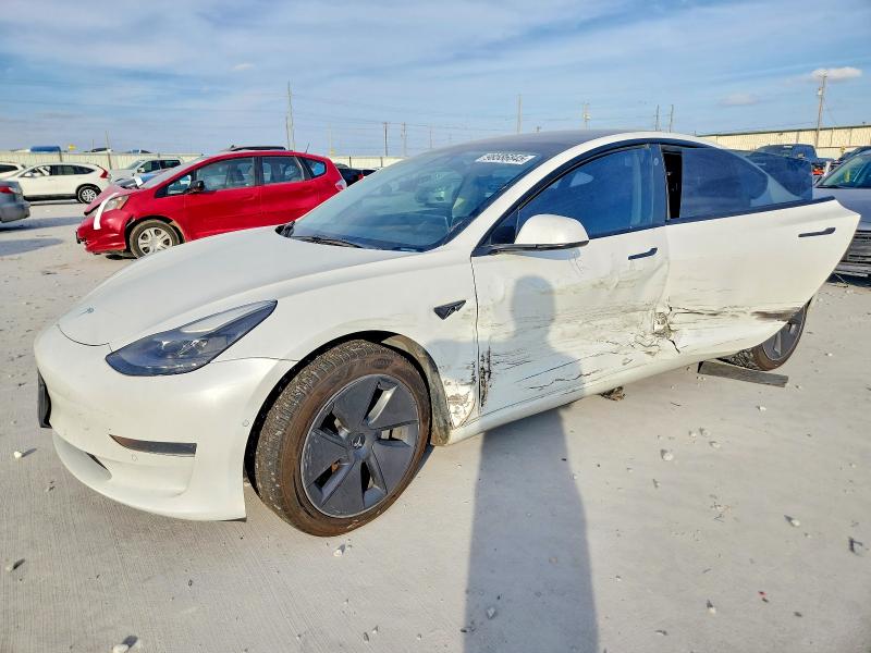 TESLA MODEL 3 2021 with VIN 5YJ3E1EA9MF085594 - Photo from auction