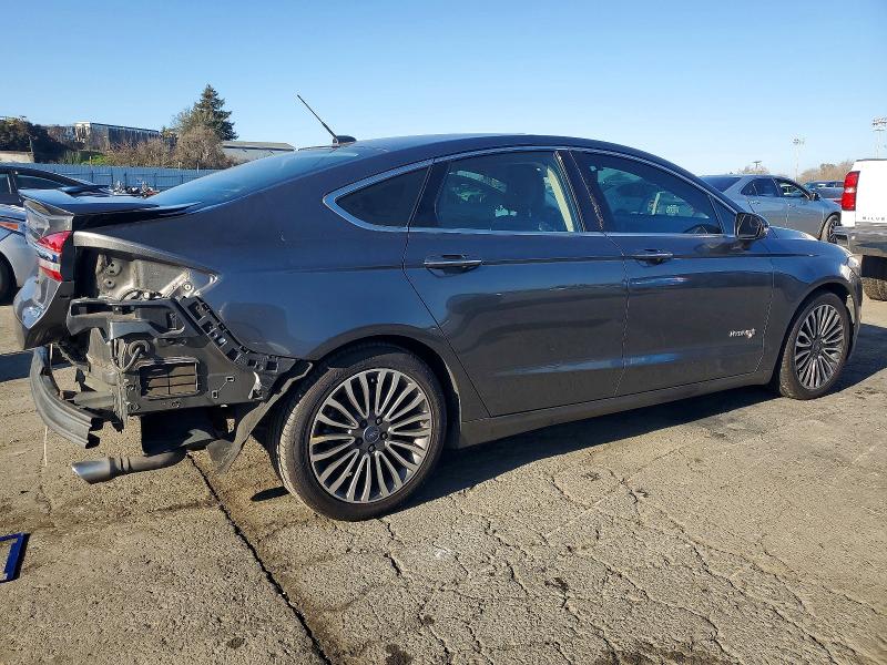 Photo 3 from auction – 2018 FORD FUSION TIT with VIN 3FA6P0RU4JR218705