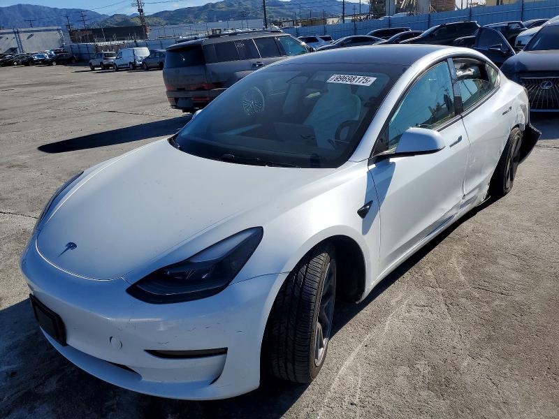 TESLA MODEL 3 2023 with VIN 5YJ3E1EA5PF639248 - Photo from auction
