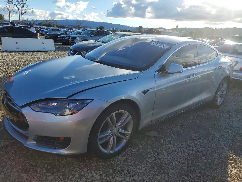 TESLA MODEL S 2013 with VIN 5YJSA1AC8DFP10906 - Photo from auction