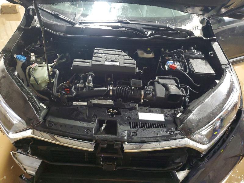 Photo 11 from auction – 2018 HONDA CR-V with VIN 7FARW2H58JE019646