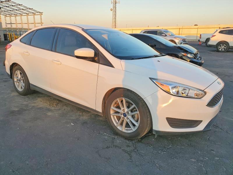 Photo 4 from auction – 2018 FORD FOCUS SE with VIN 1FADP3F28JL273507