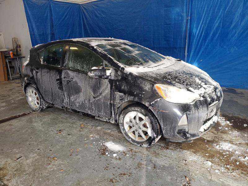 Photo 4 from auction – 2014 TOYOTA PRIUS C with VIN JTDKDTB31E1083526