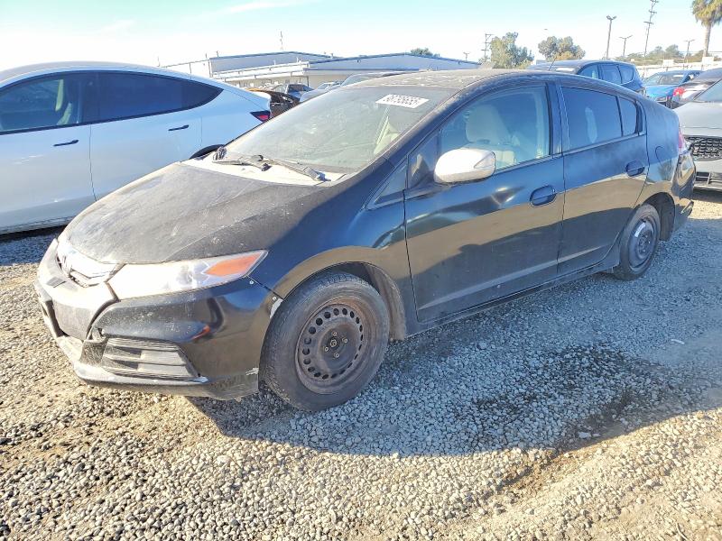 HONDA INSIGHT 2012 with VIN JHMZE2H31CS004634 - Photo from auction