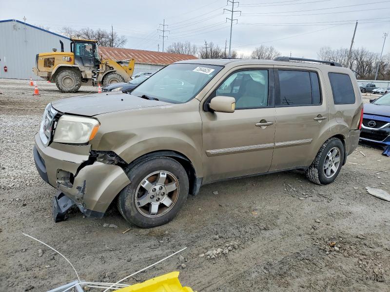 HONDA PILOT TOUR 2011 with VIN 5FNYF4H94BB033549 - Photo from auction