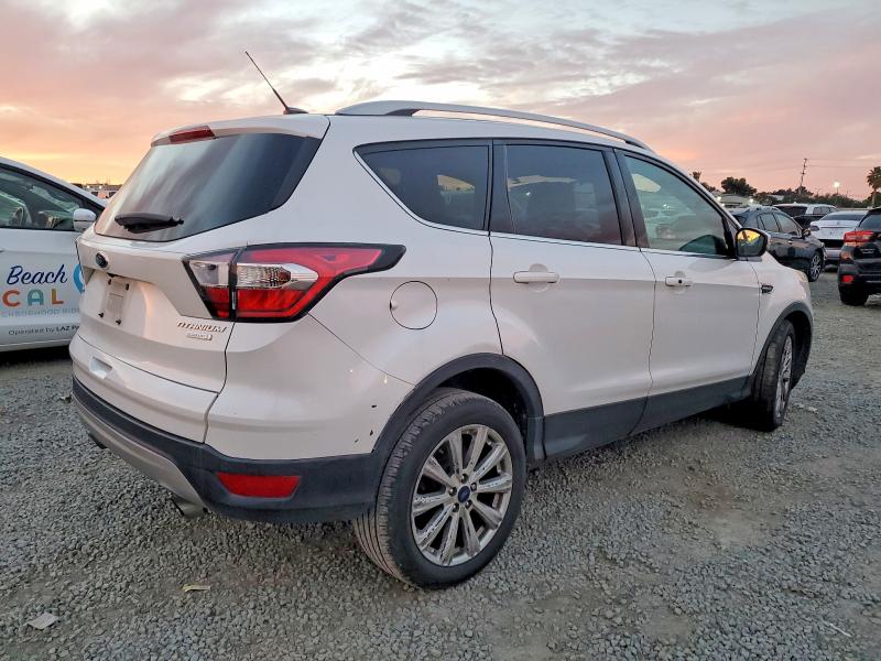 Photo 3 from auction – 2017 FORD ESCAPE TIT with VIN 1FMCU0J99HUB44595