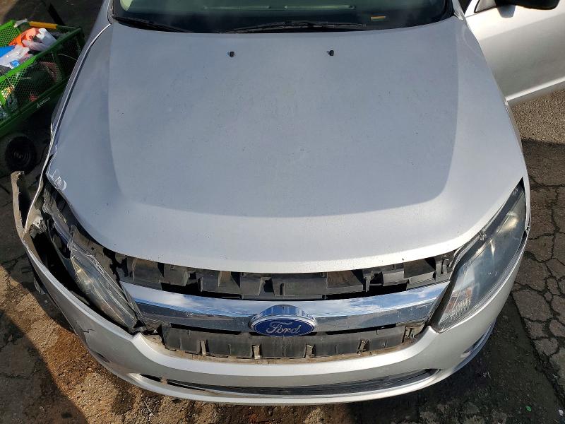 Photo 11 from auction – 2011 FORD FUSION S with VIN 3FAHP0GA6BR243513
