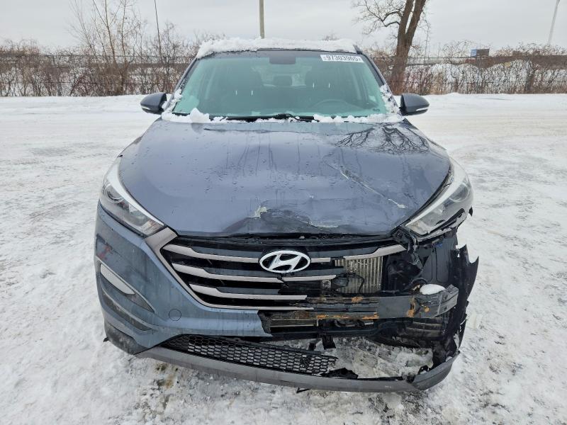 Photo 5 from auction – 2016 HYUNDAI TUCSON LIM with VIN KM8J3CA29GU107642