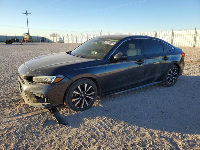 HONDA CIVIC EX 2023 with VIN 2HGFE1F7XPH319497 - Photo from auction