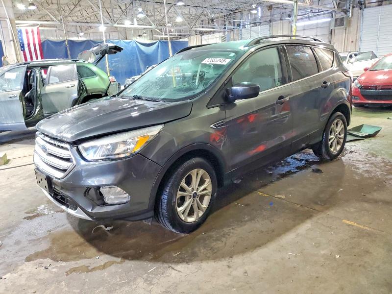 FORD ESCAPE SE 2017 with VIN 1FMCU0GD9HUE10581 - Photo from auction