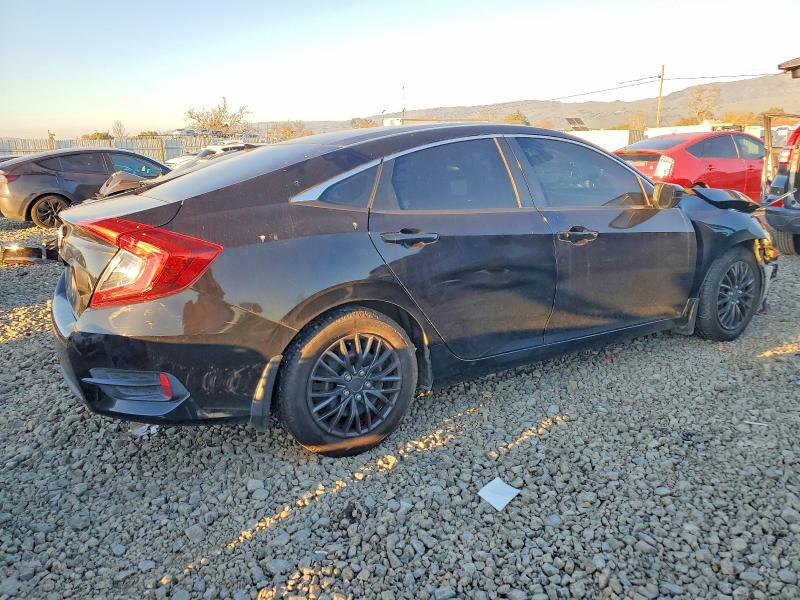 Фото 3 с аукциона – 2017 HONDA CIVIC LX с VIN 2HGFC2F52HH516160