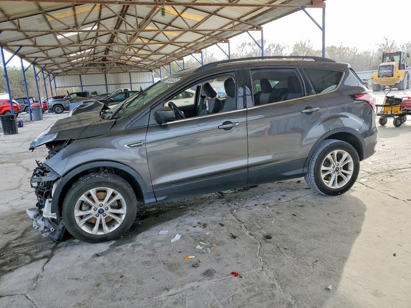 FORD ESCAPE SE 2018 с VIN 1FMCU9GD8JUB33612 - Фото с аукциона