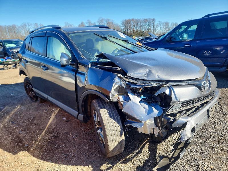 Photo 4 from auction – 2016 TOYOTA RAV4 LE with VIN JTMZFREV8GJ061342