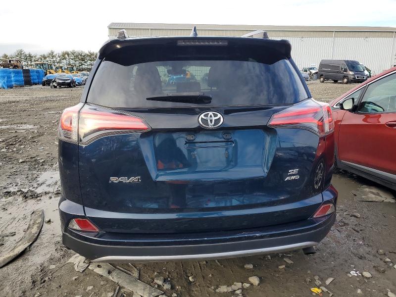Photo 6 from auction – 2018 TOYOTA RAV4 SE with VIN JTMJFREV4JJ256276