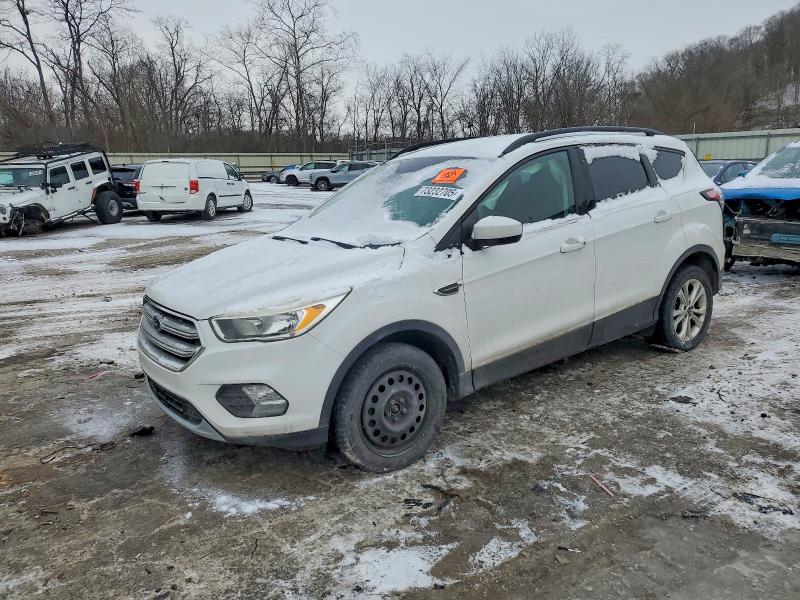 FORD ESCAPE 2018 with VIN 1FMCU9GD7JUA58045 - Photo from auction