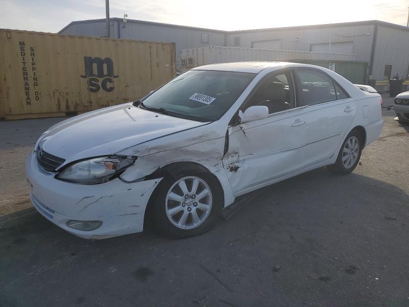 TOYOTA CAMRY LE 2003 with VIN 4T1BF32K93U050556 - Photo from auction